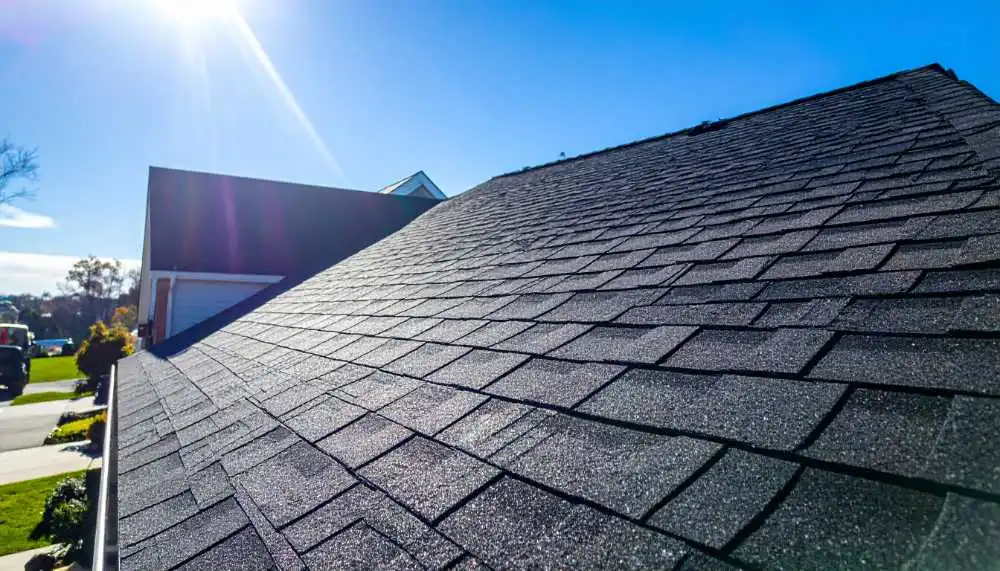 Inspector reviewing roofing compliance documents in New Jersey.