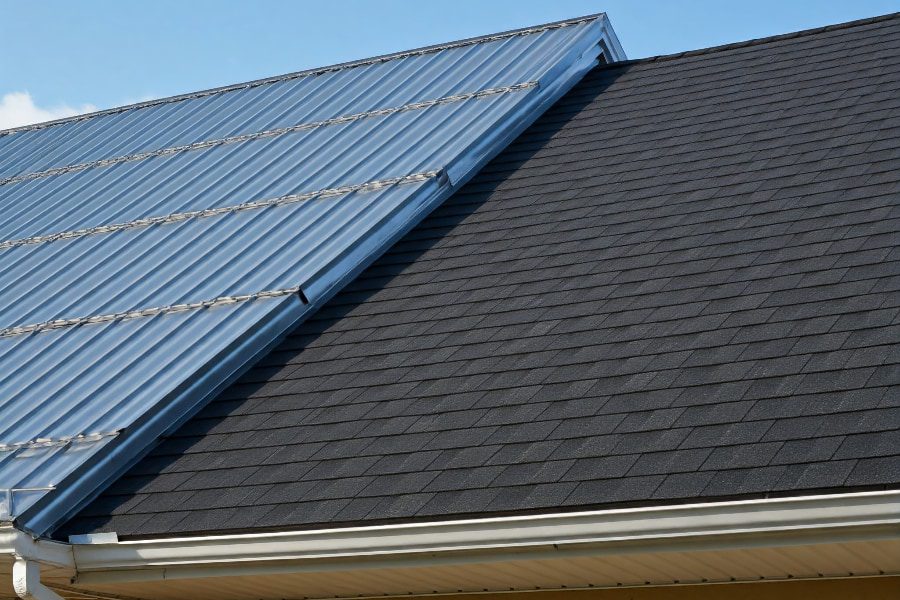 Insulation and ventilation components in attic space.