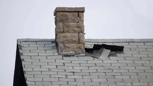 Step flashing repair on residential roof in New Jersey